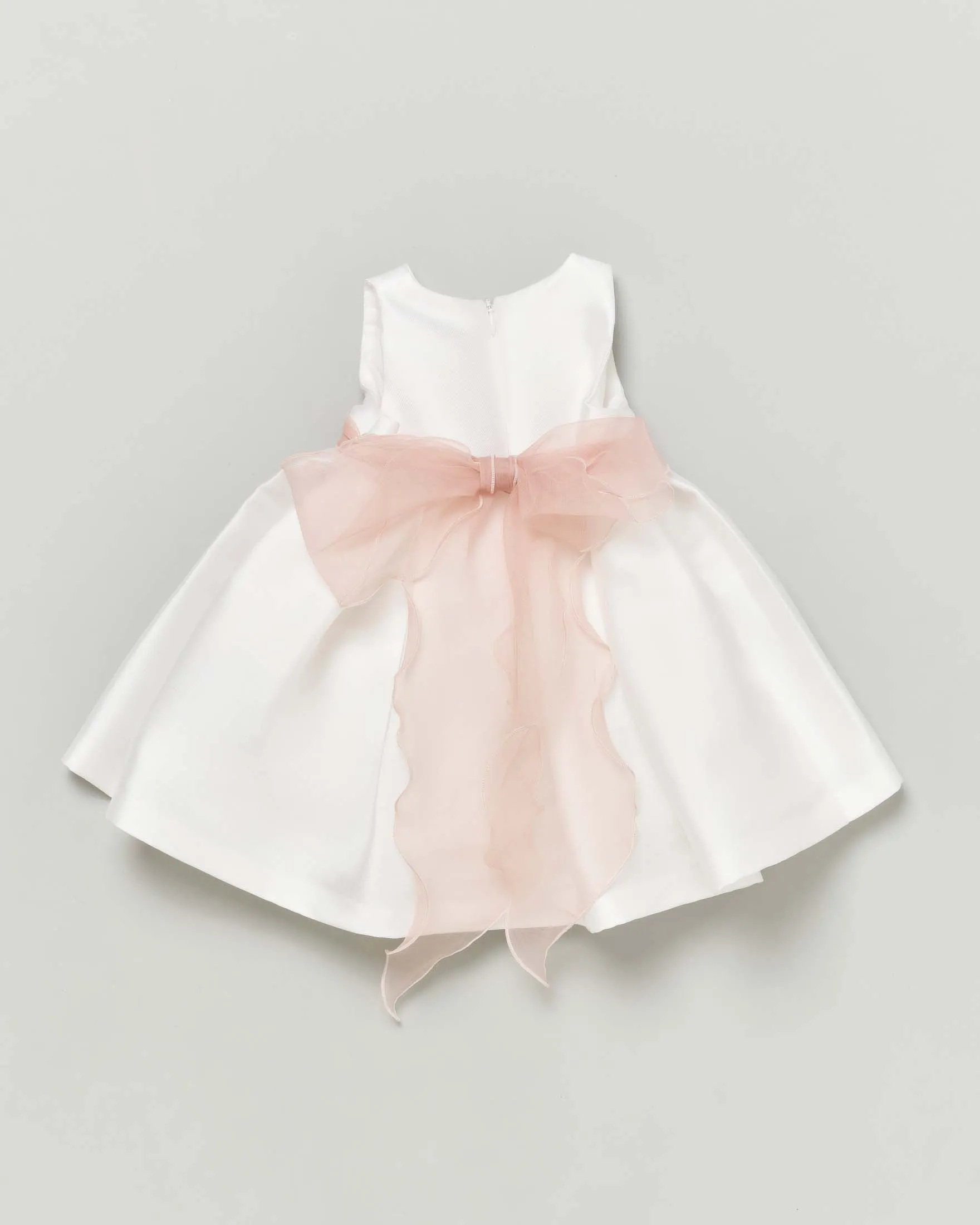 Abito corto bianco senza maniche con gonna ampia e fascia in organza rosa con fiori 36 mesi