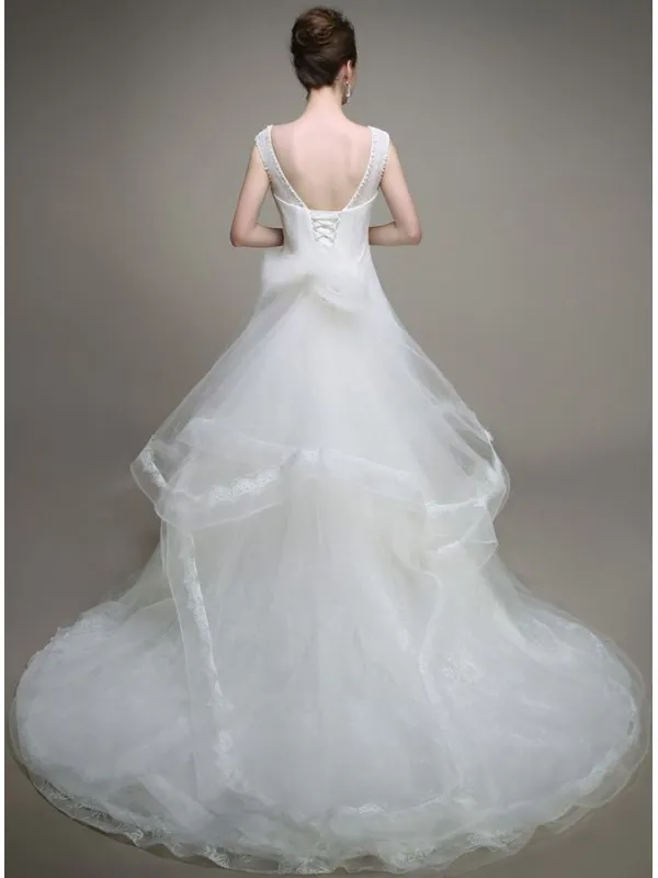 Abito da Sposa con chiusura a lacci e spalline e gonna in organza