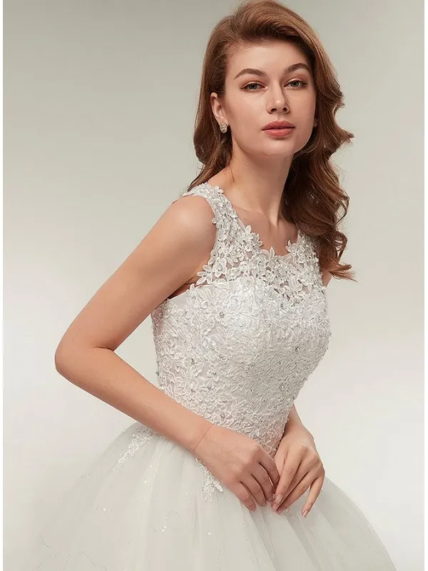 Abito da Sposa con corpetto in pizzo macramè con bretelle e gonna glitter ampia