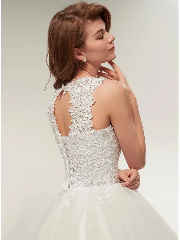 Abito da Sposa con corpetto in pizzo macramè con bretelle e gonna glitter ampia