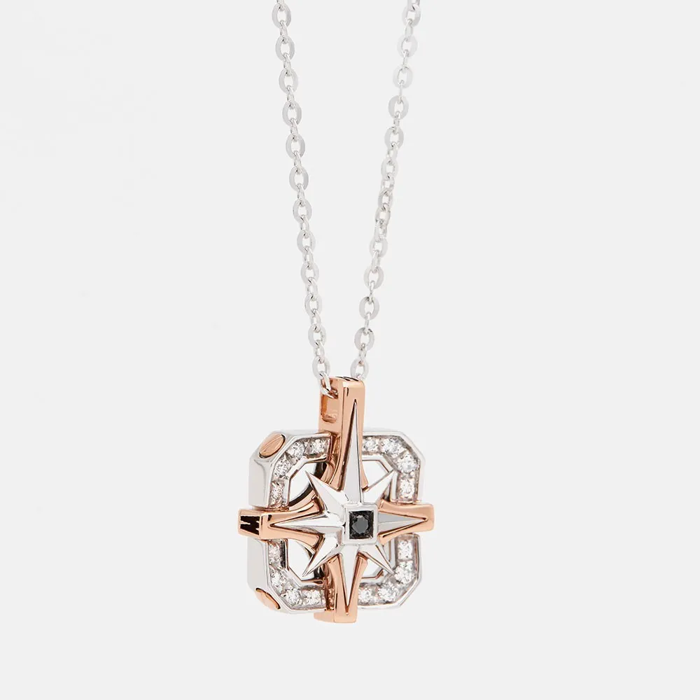 Collana  zancan in oro con pendente rosa dei venti e diamanti.