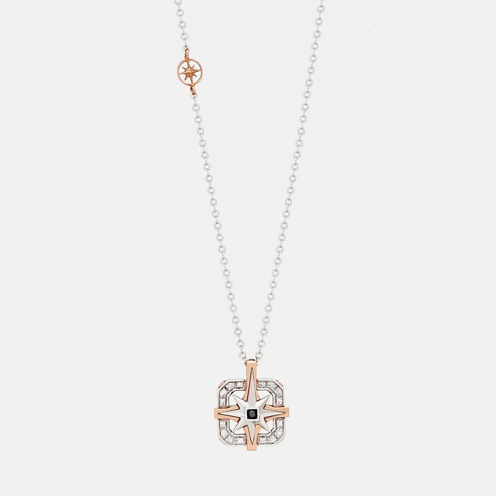Collana  zancan in oro con pendente rosa dei venti e diamanti.