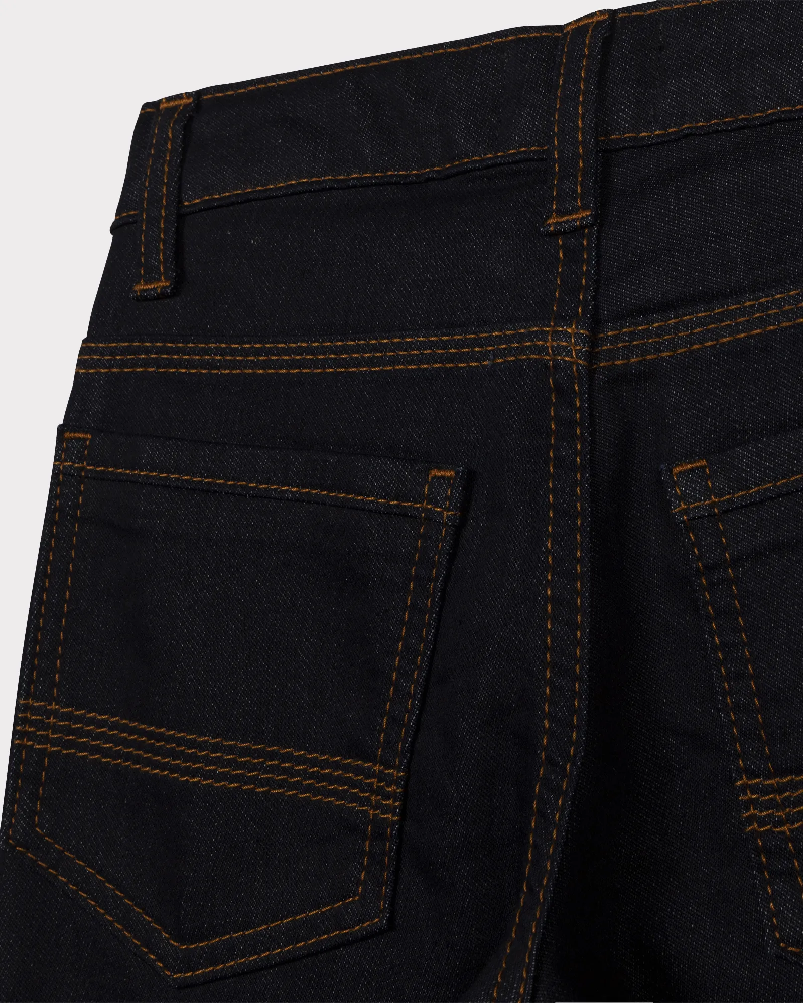 Jeans blu scuro in cotone stretch con impunture arancioni 6-12 anni