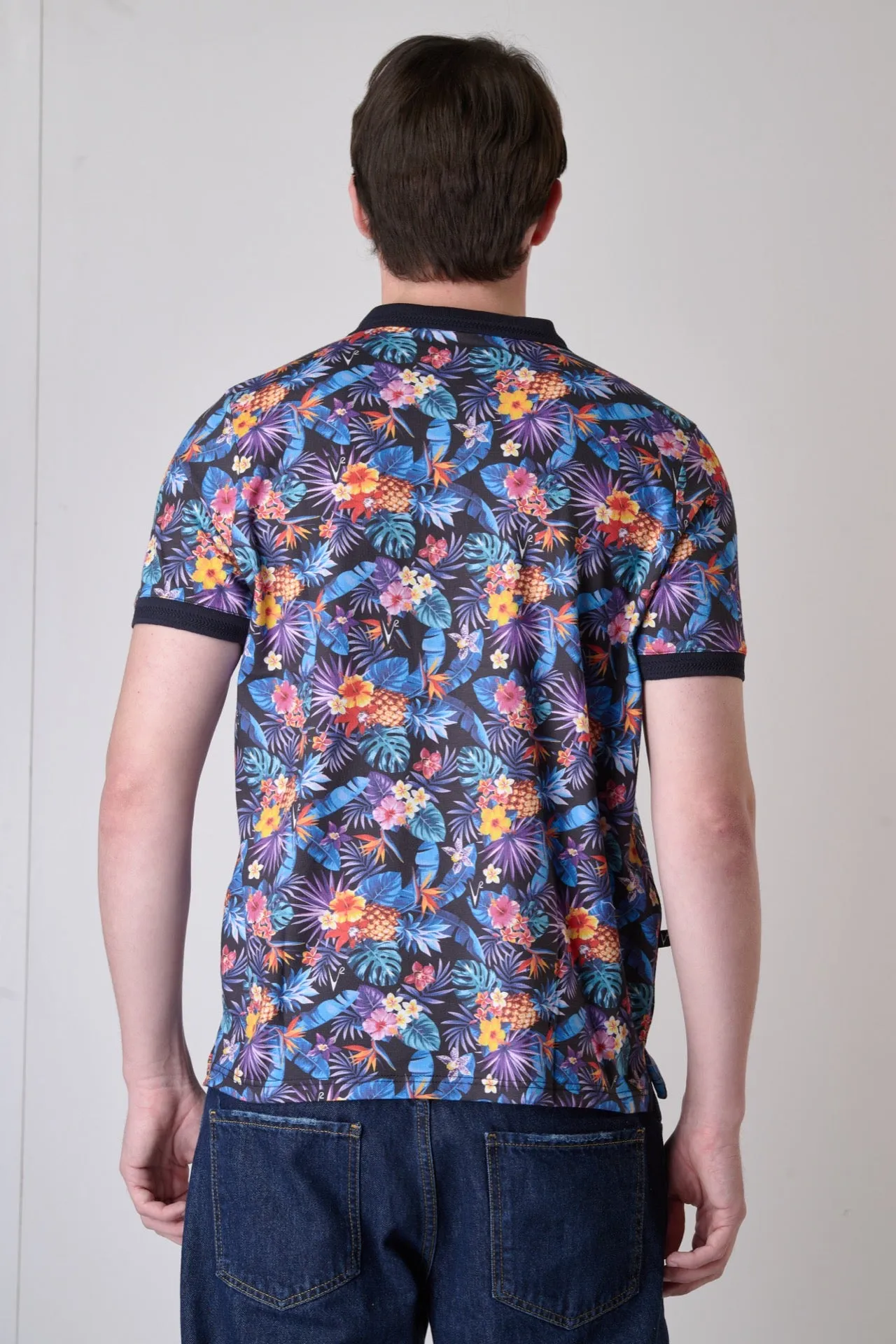 Polo stampate all-over con fantasia Tropical