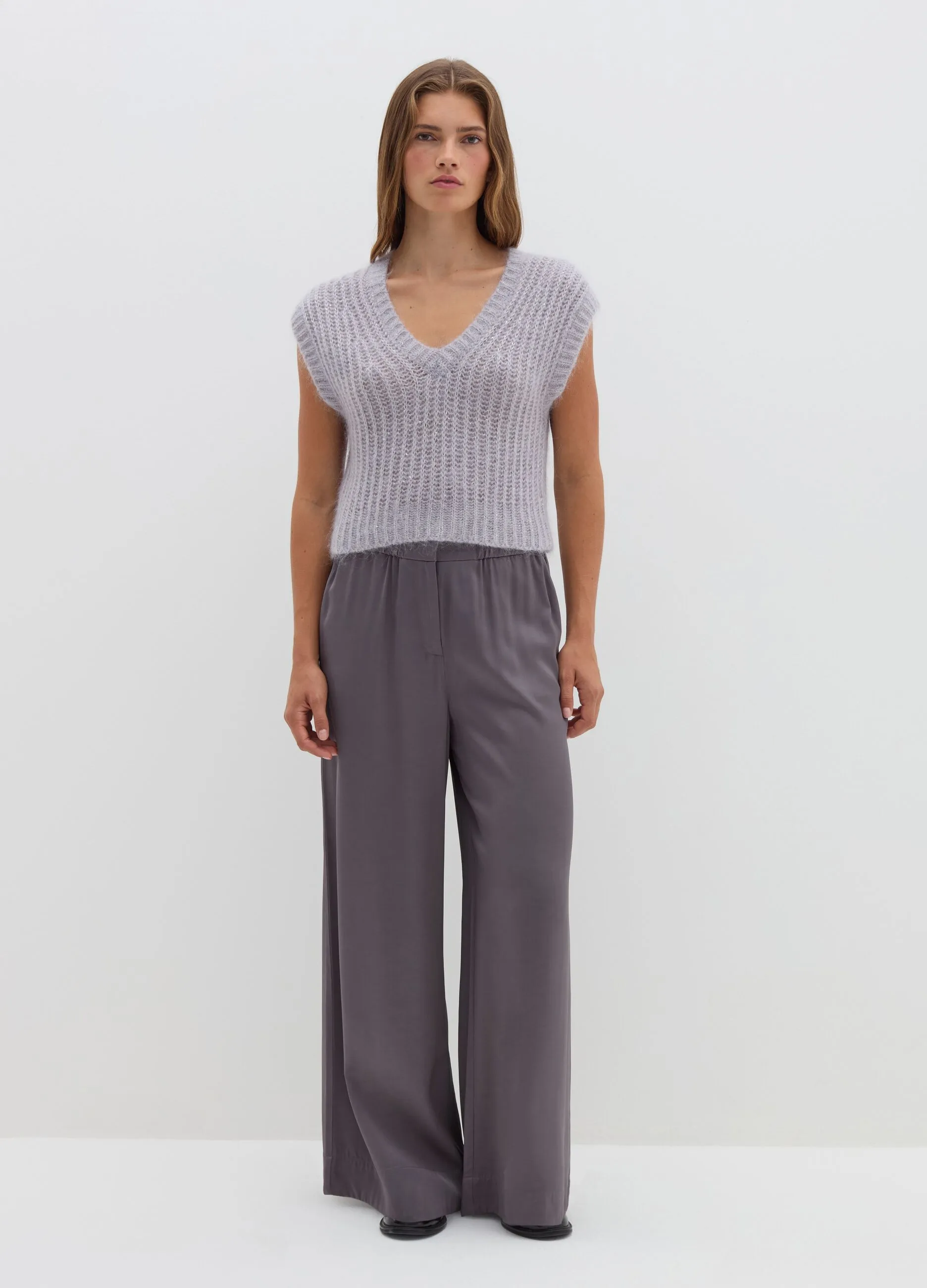 Pullover smanicato con micro paillettes