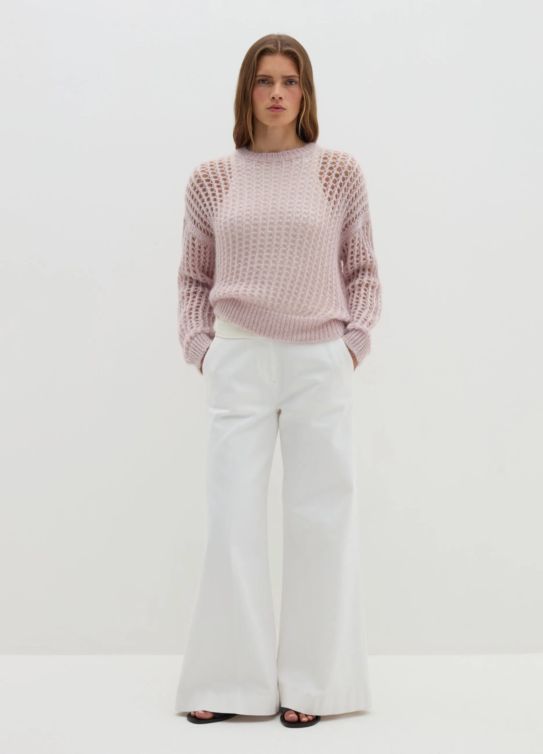 Pullover traforato in mohair con micro paillettes